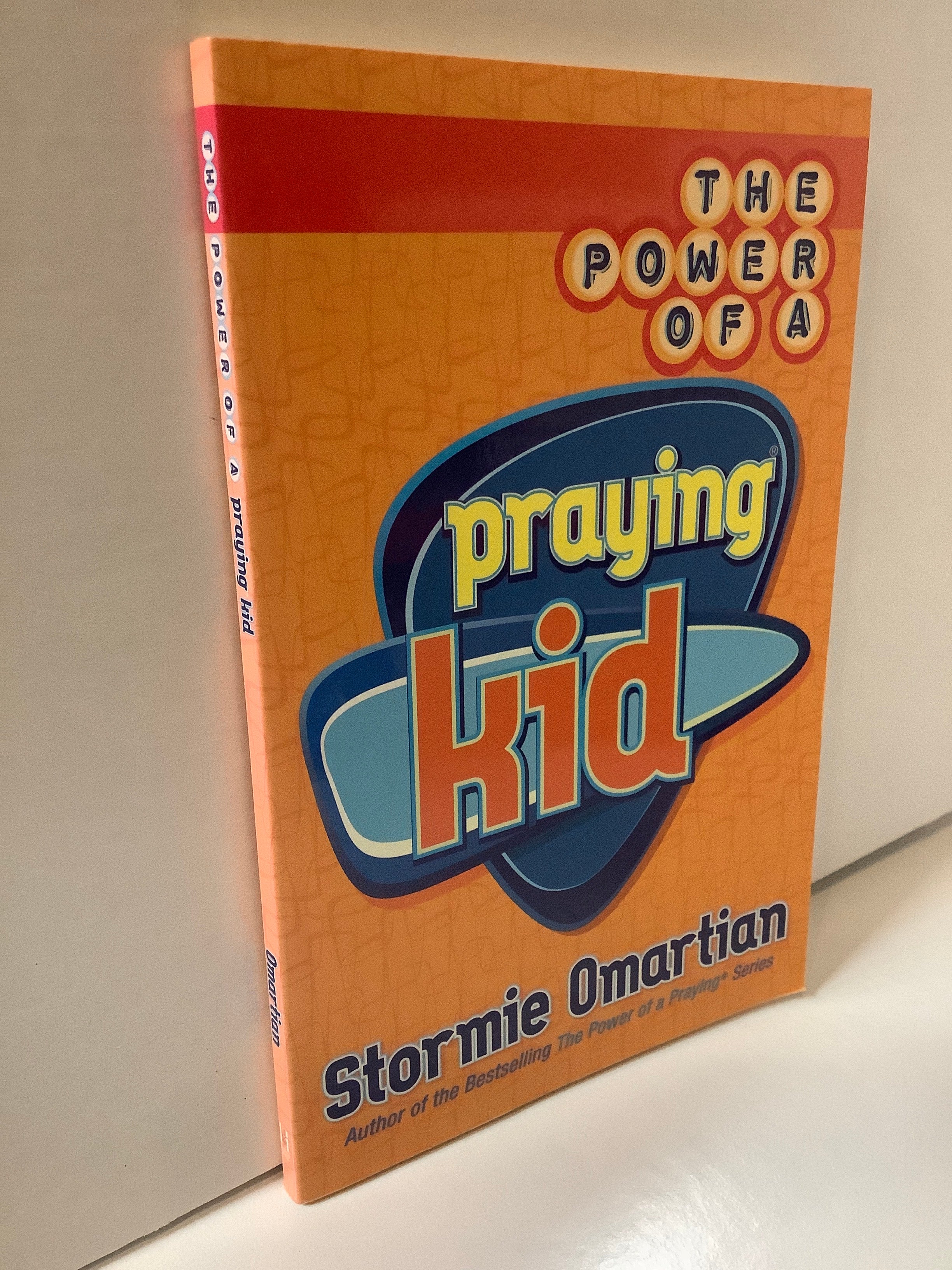 Book/Power/Praying Kid